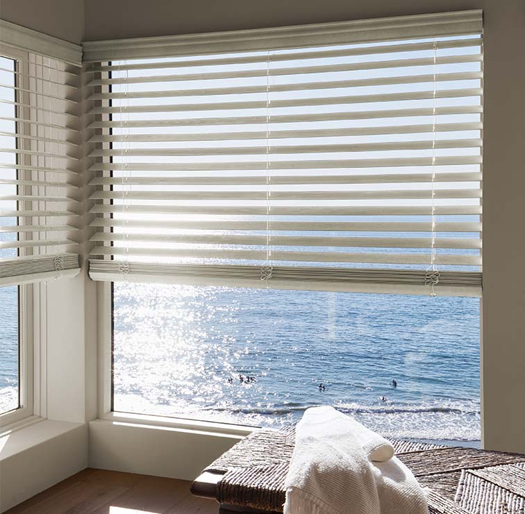 Wood Blinds in a Bedroom looking at the Ocean